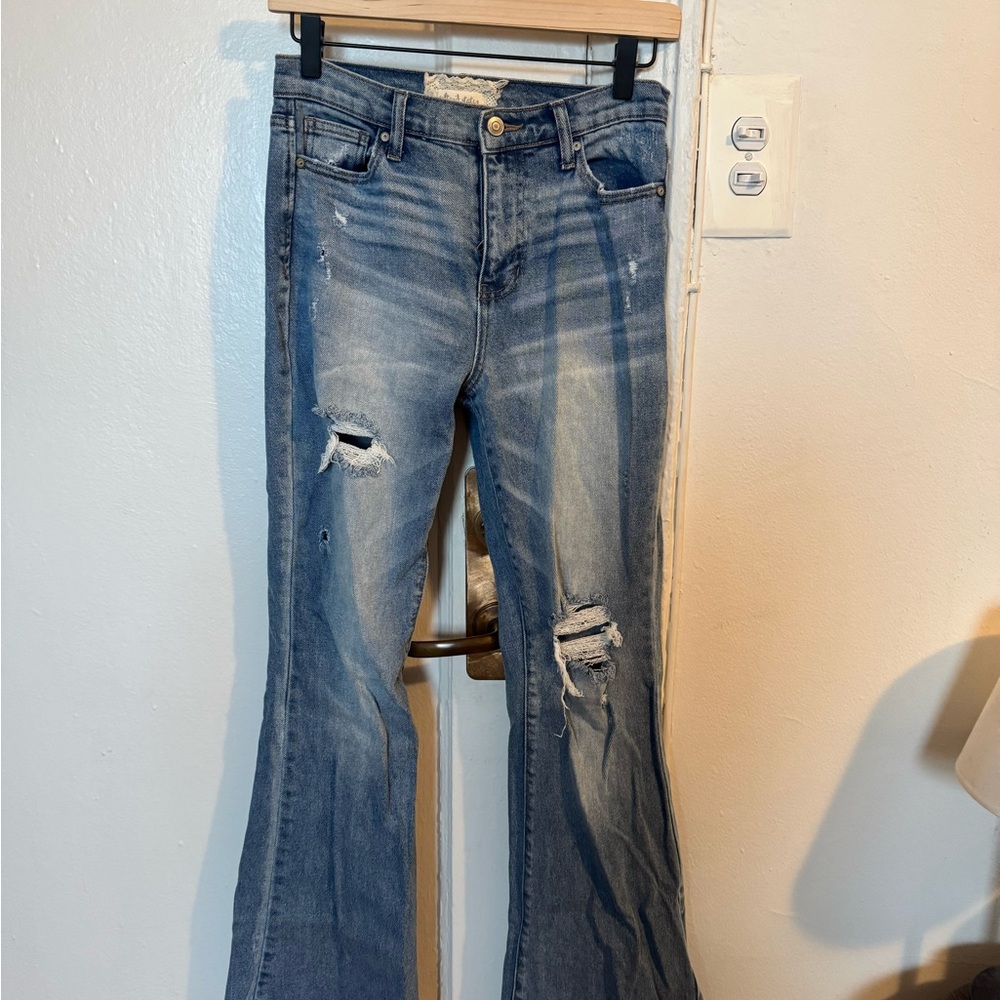 Women's Distressed Blue Jeans